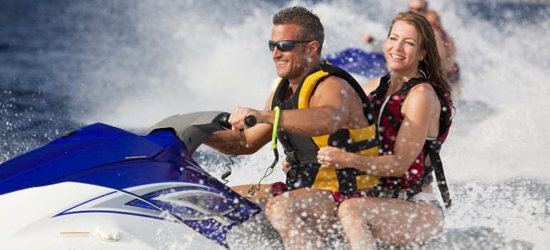 couple riding a jetski